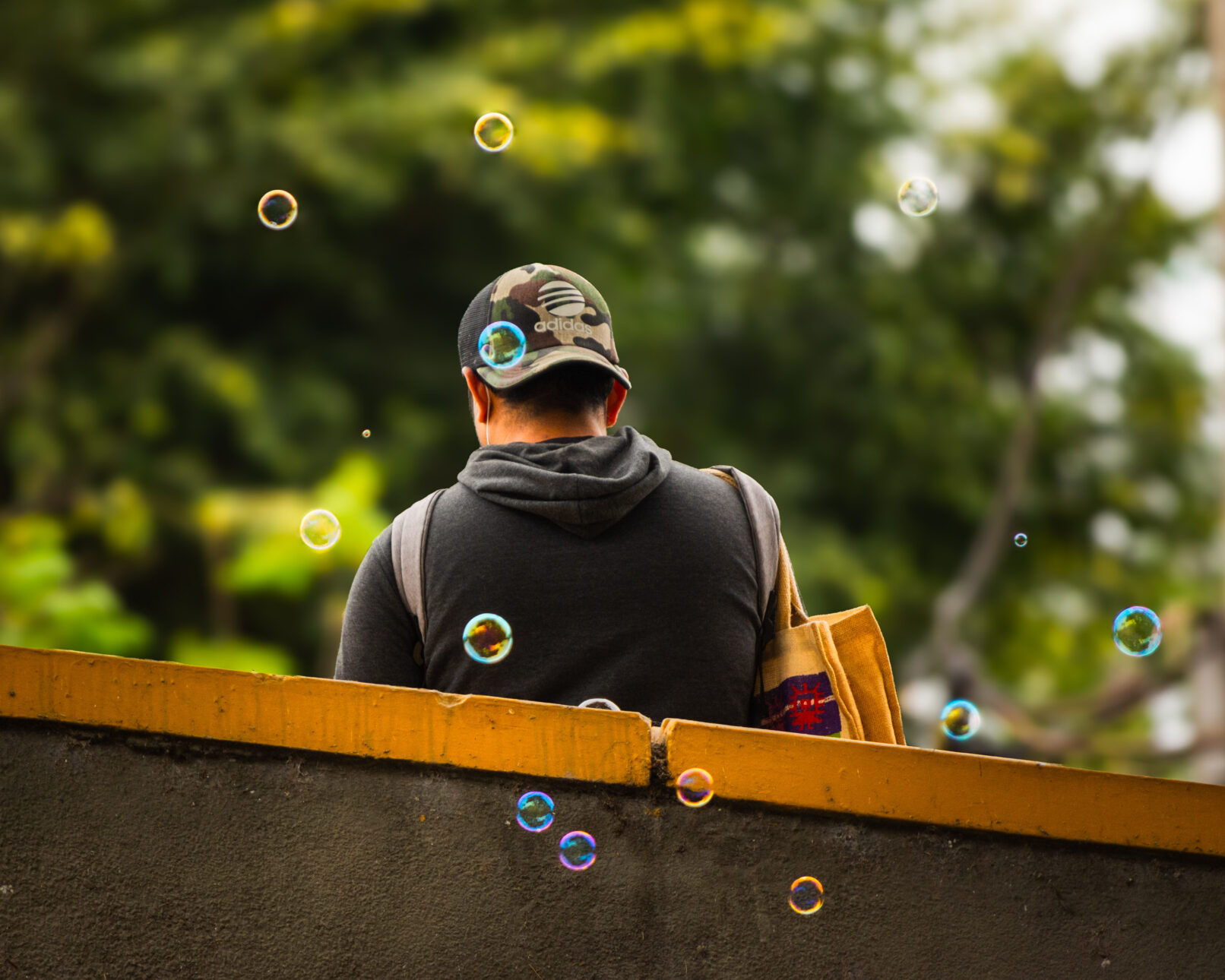 Man blowing bubbles