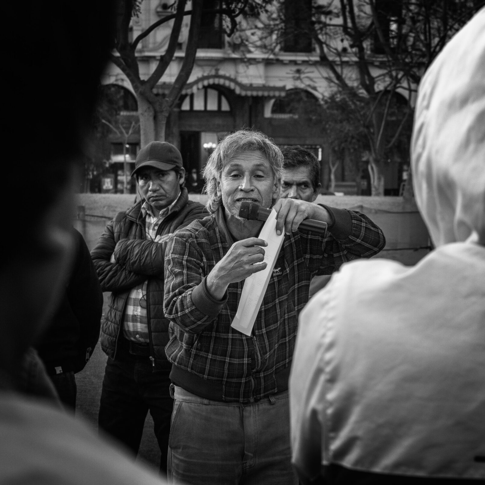 Man talking at demonstration, Lima, Peru