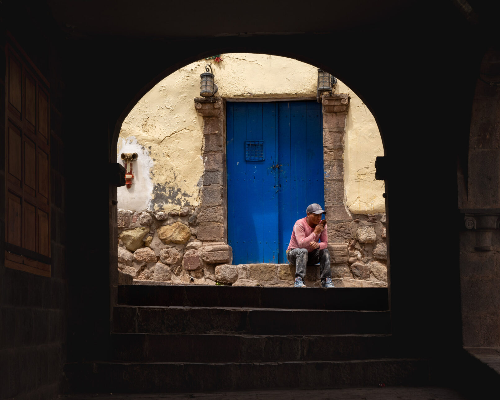 Peruvian man in arch