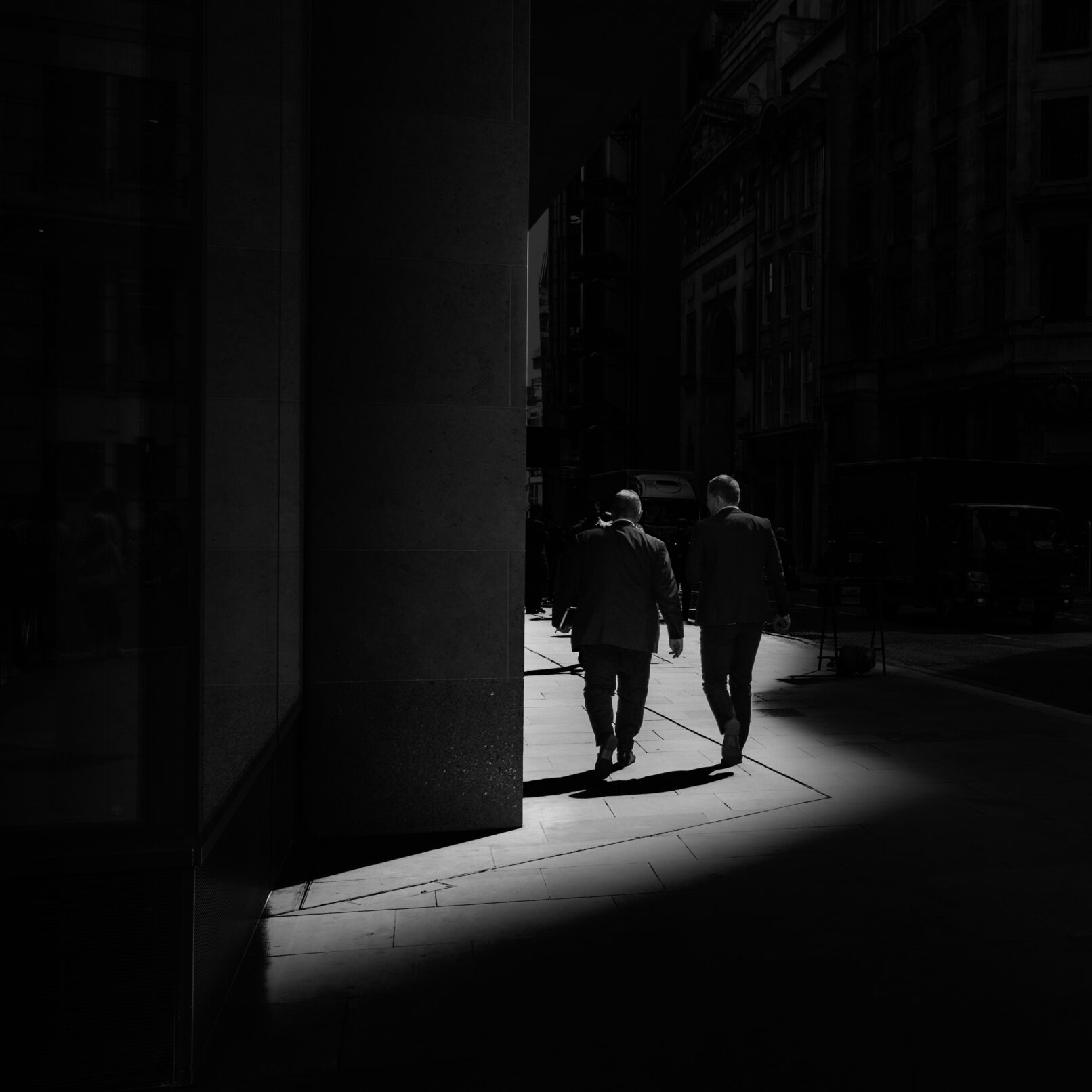 two men on street, London