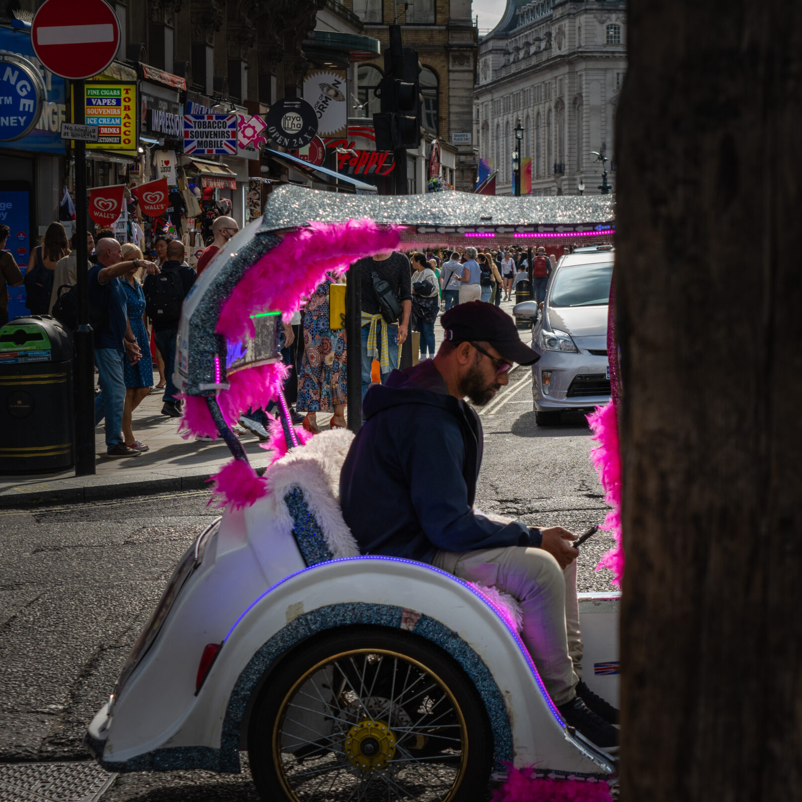 man in fuzzy pink car, London